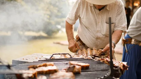 Man preparing Parrilhada in Argentina