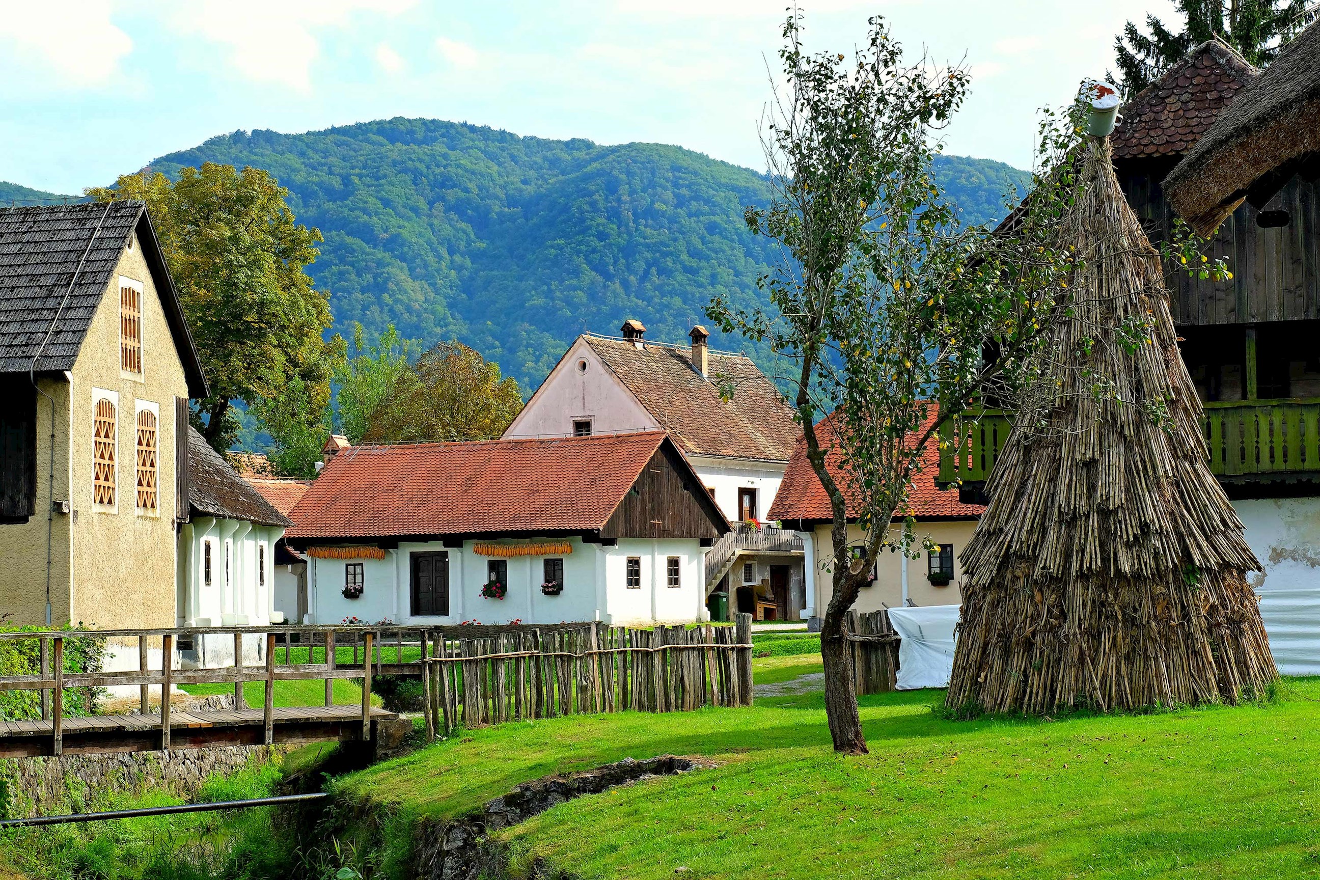 A scenic view of buildings and greenery in Kumrovec, Croatia