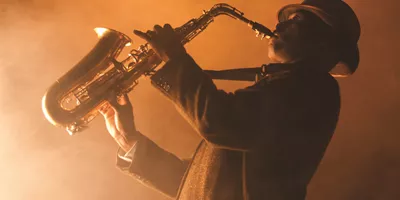 Musician Playing Saxophone On Stage, USA