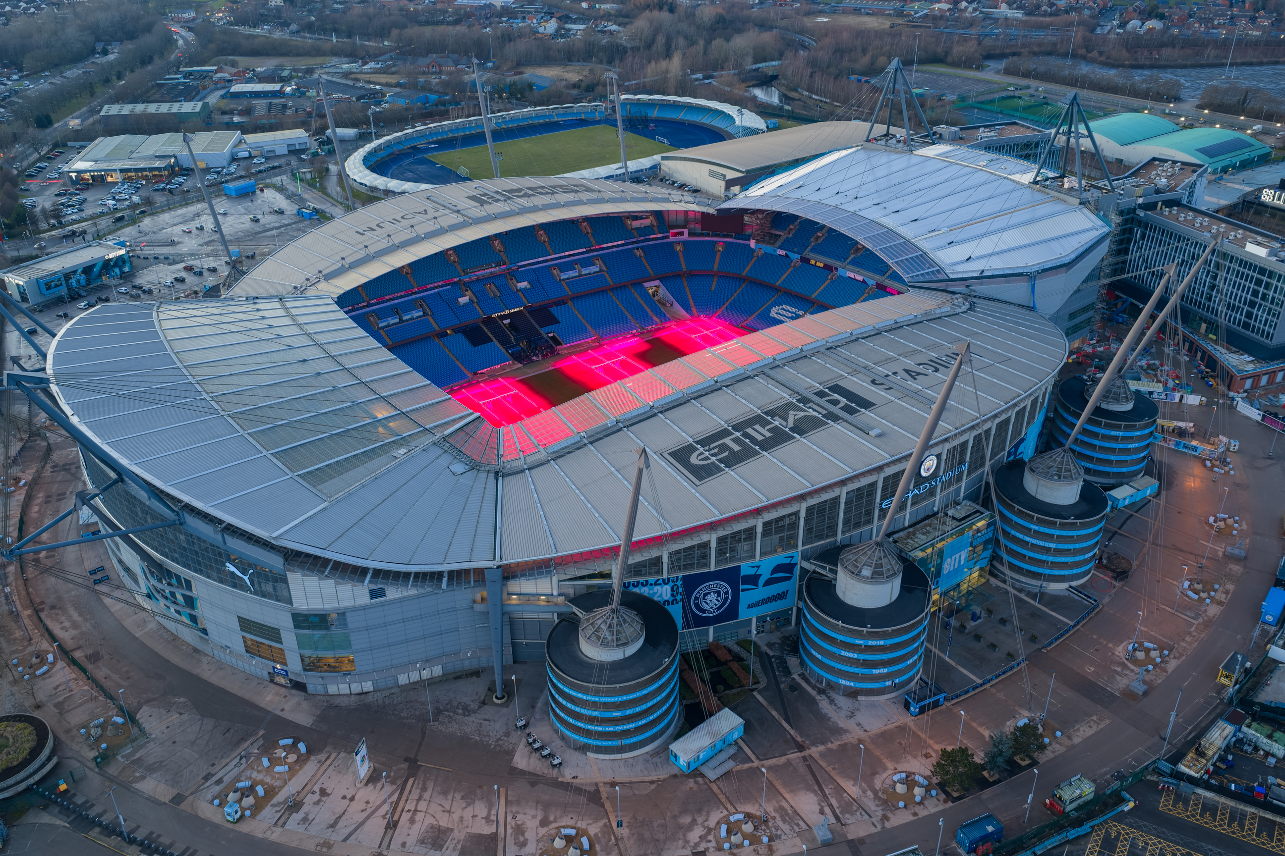 a-high-angle-aerial-view-of-the-etihad-stadium-in-manchester-2256701838.jpg