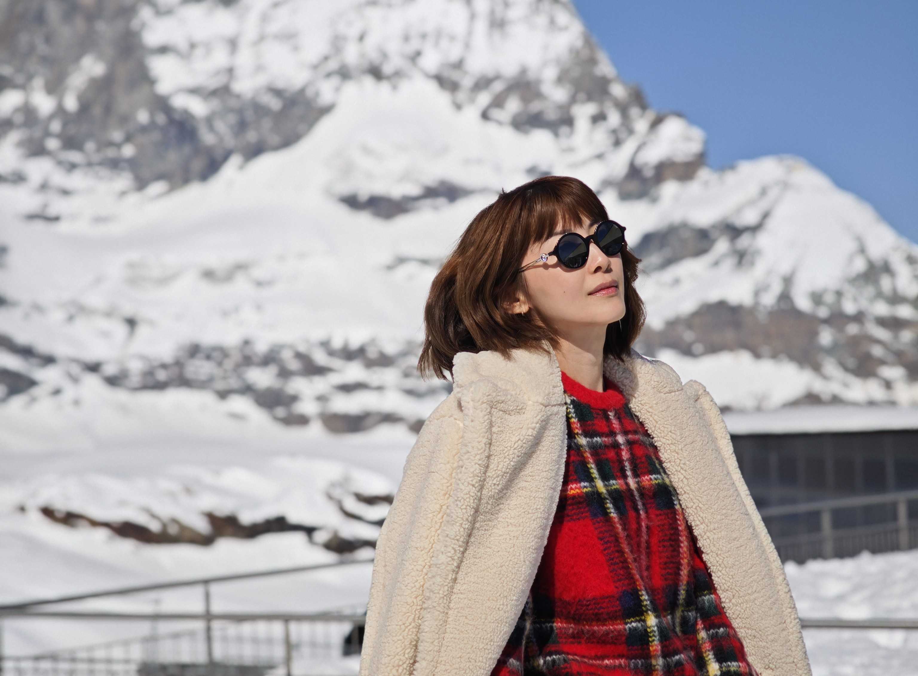 Jeanette in front of a snowy mountain, Switzerland