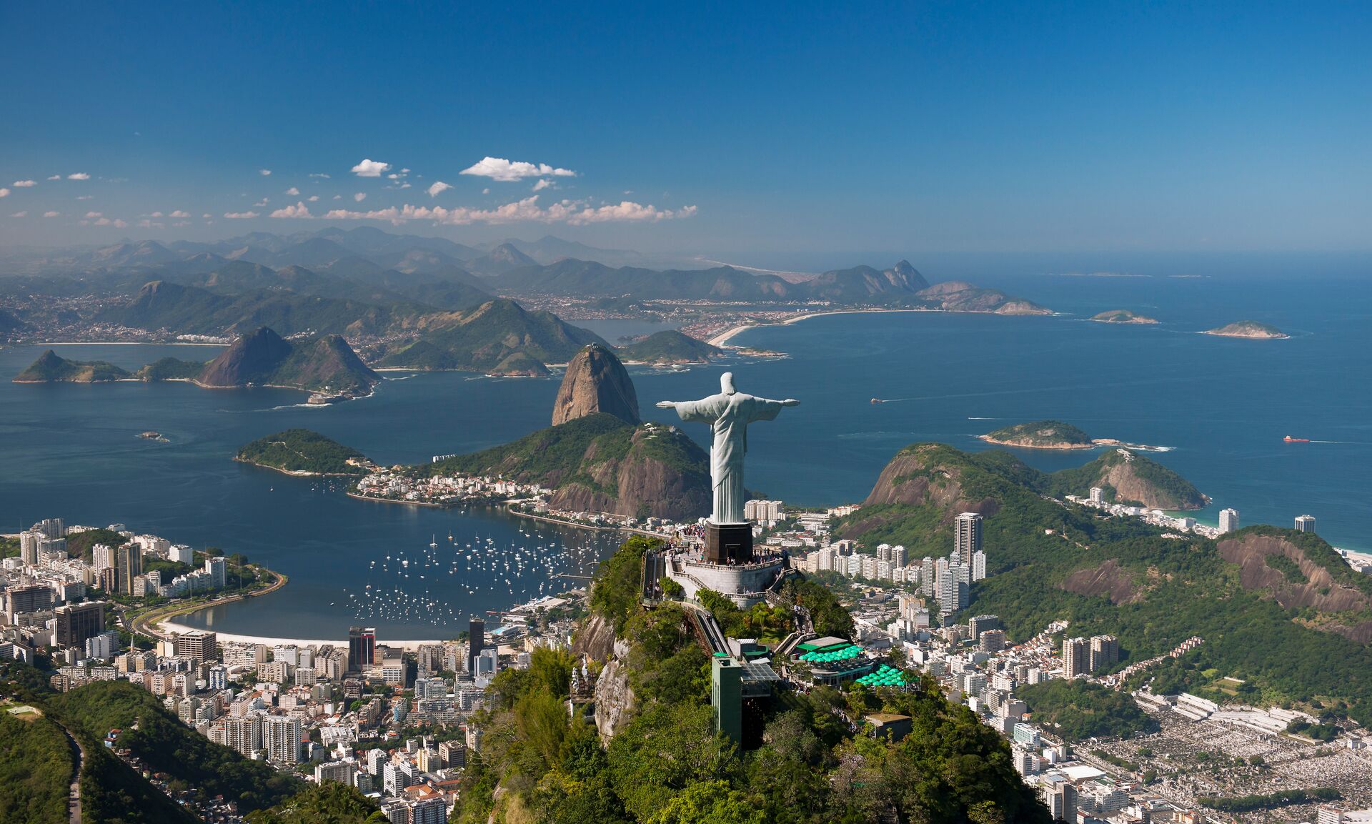 Christ the Redeemer statue on the mountain over Rio De Janeiro city and bay in Brazil