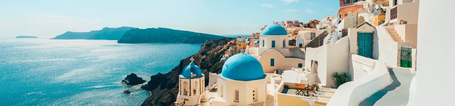 Blue and white buildings on the coast on Santorini, Greece