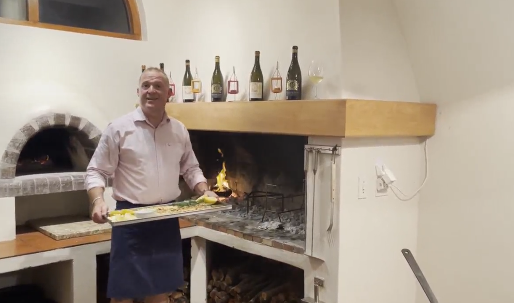 Stefan Hermanus stood next to a traditional oven in South Africa