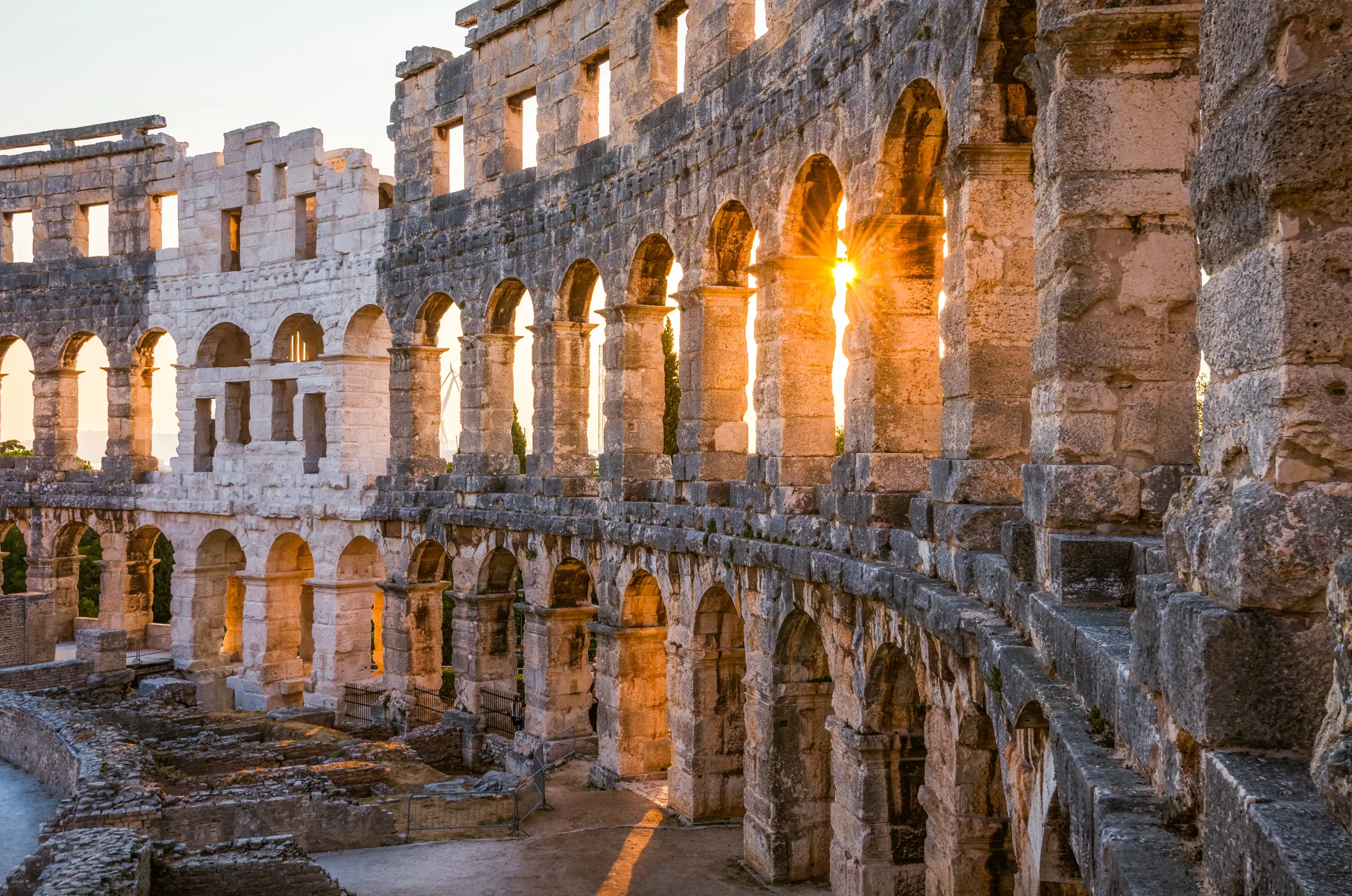 day-hero-architectural-details-of-pula-coliseum-pula-croatia.webp