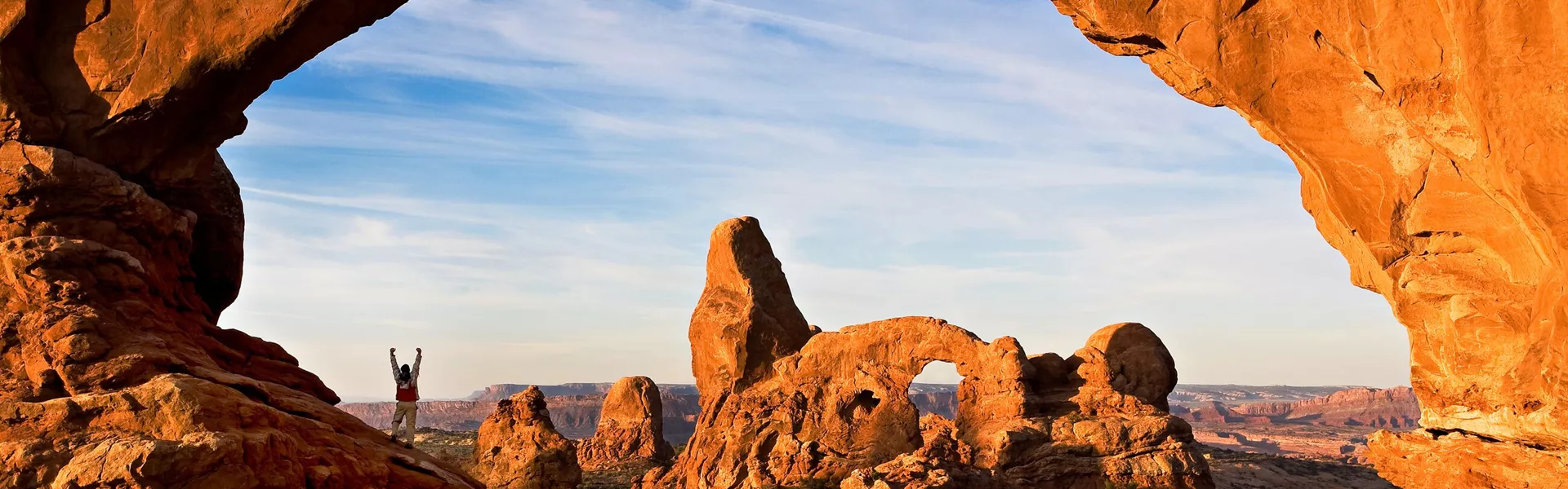 Hiker in North Window Arch, Utah