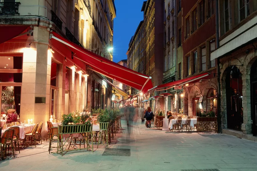 Outdoor cafes at night in Lyon, France