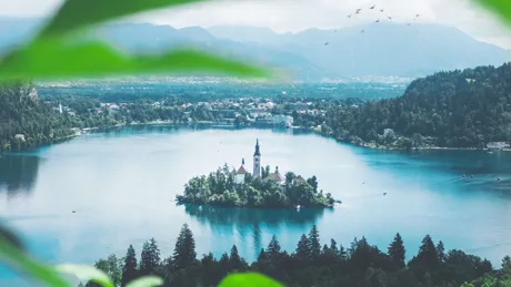 View on Lake Bled with mountains in background, Slovenia