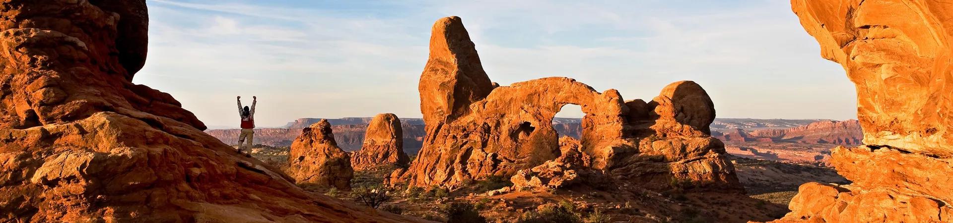 Hiker In North Window Arch, Utah