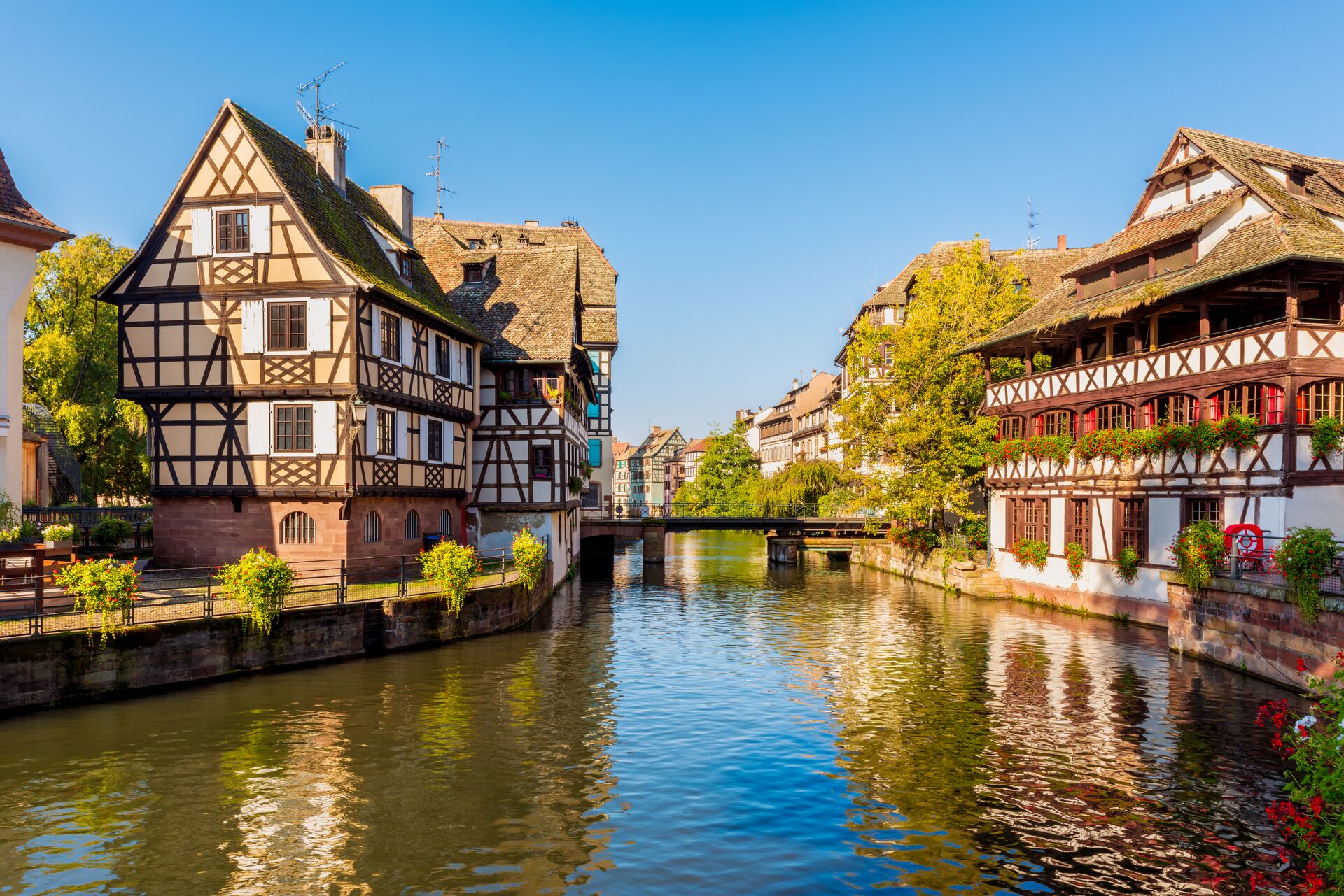 River and bridge in Strasbourg, France on a sunny day