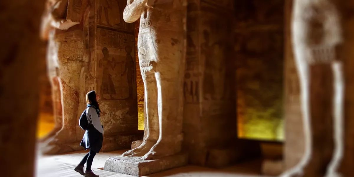 A traveller admiring pharaohs' monuments in Egypt