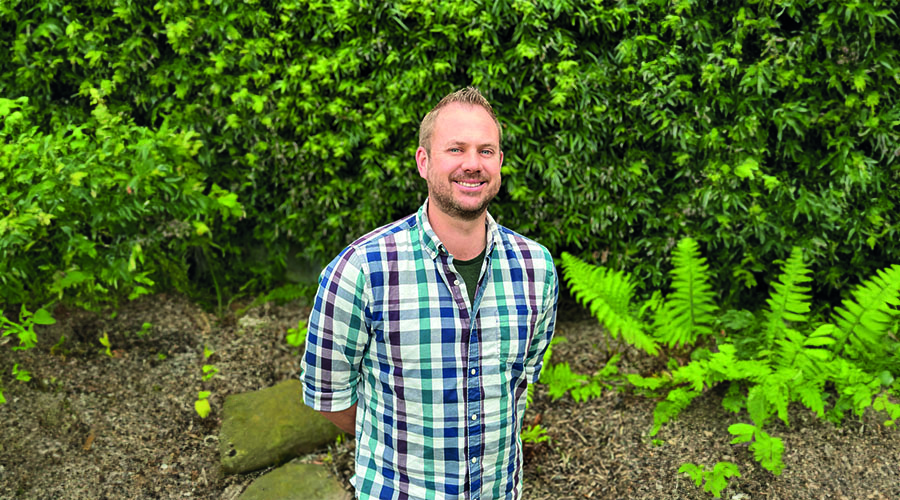 Travel Director Todd Geist in front of nature