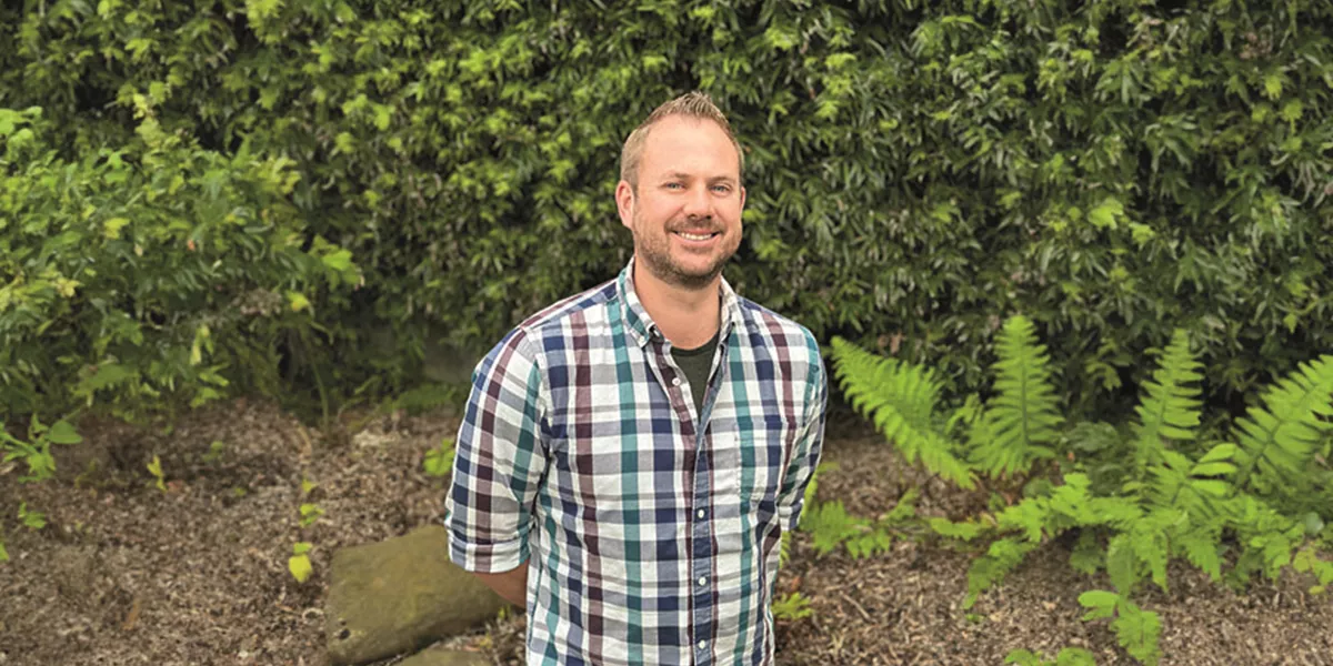 Travel Director Todd Geist in front of nature