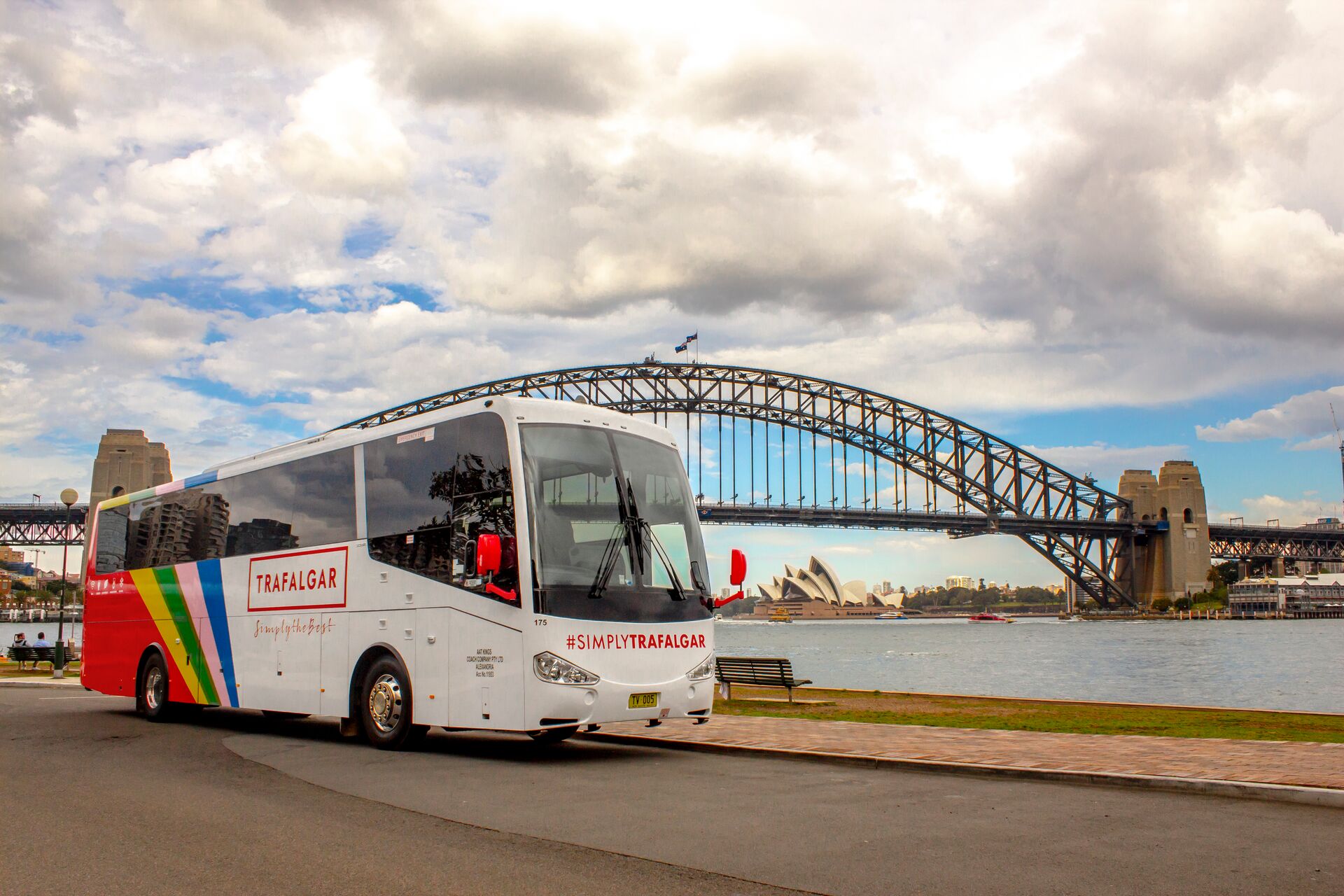 A Trafalgar coach in front of the Sydney Harbour Bridge in Sydney, Australia