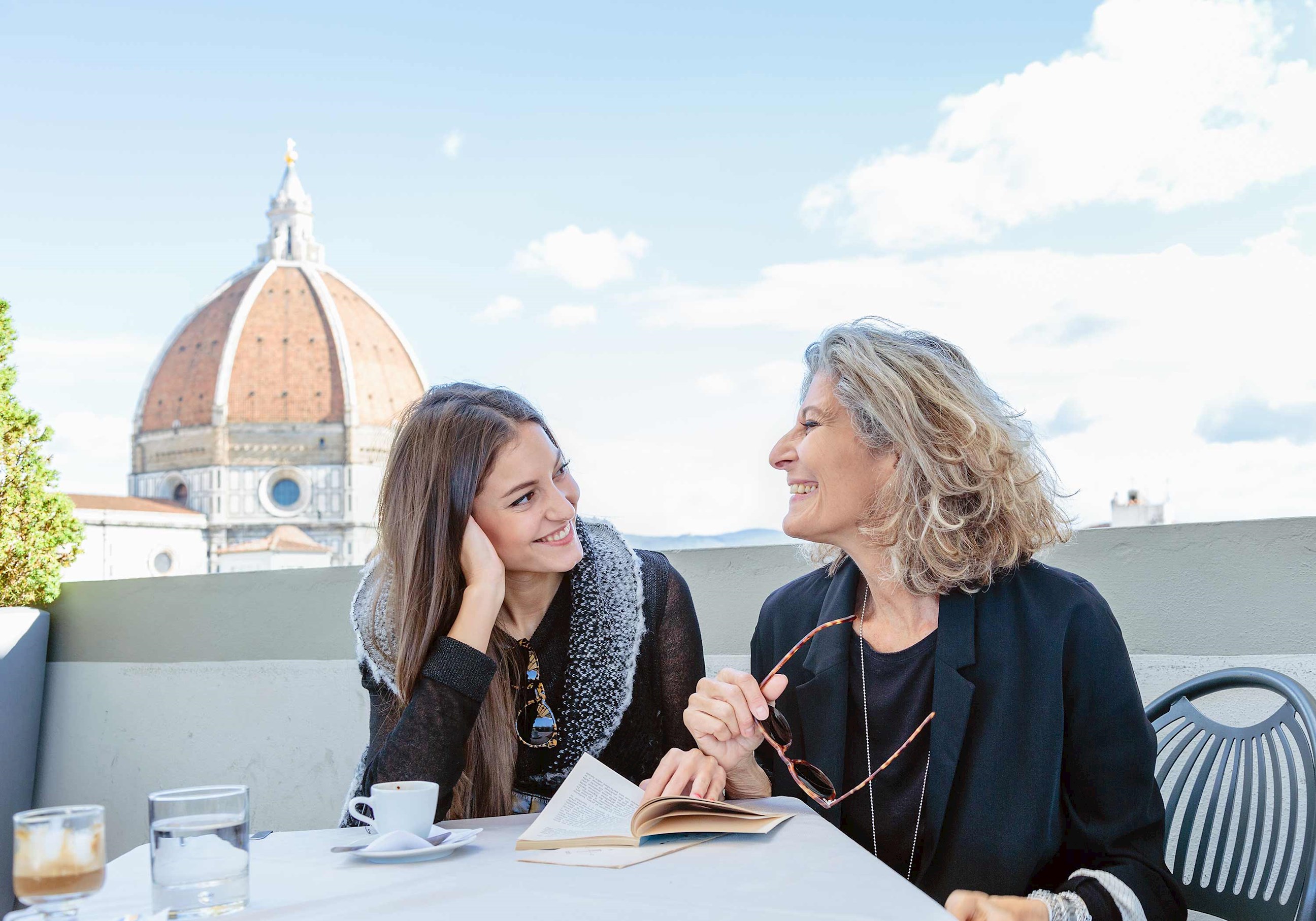 Women with view of Duomo Santa Maria Del Fiore in Florence, Italy