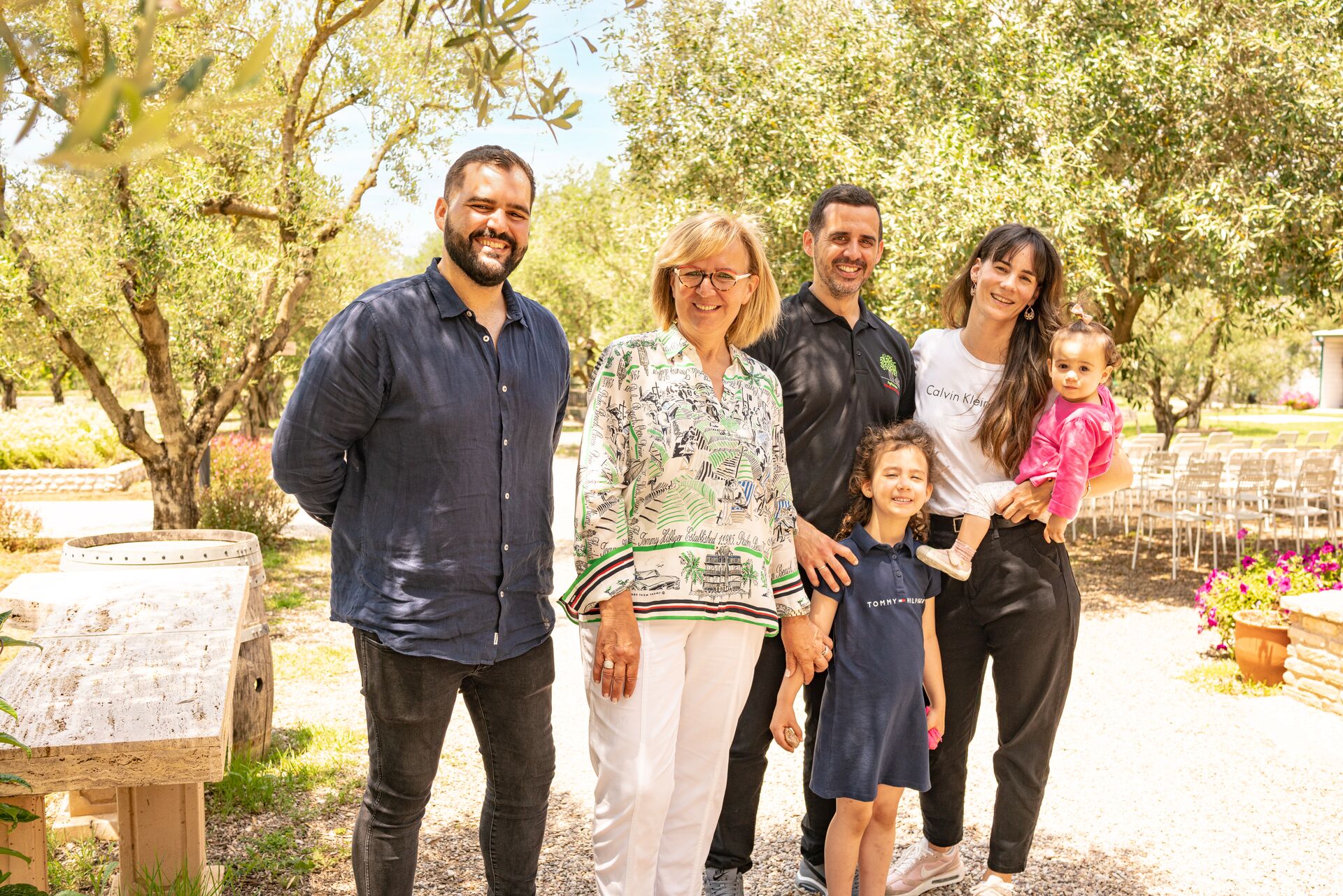 Be My Guest hosts smiling and looking at camera in Greece