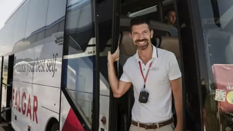Travel guide in Trafalgar bus