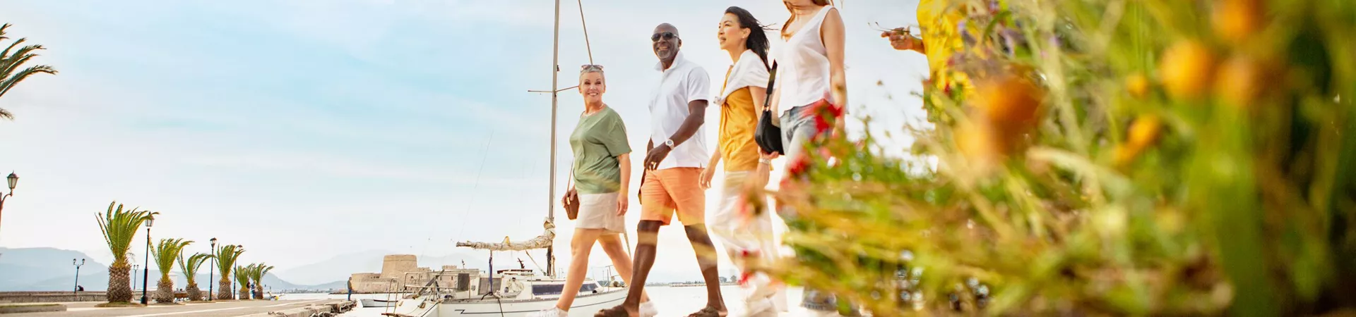 Guests On A Waterfront Walk