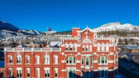 The Strater Hotel at winter surrounded with mountains in Durango, Colorado, USA