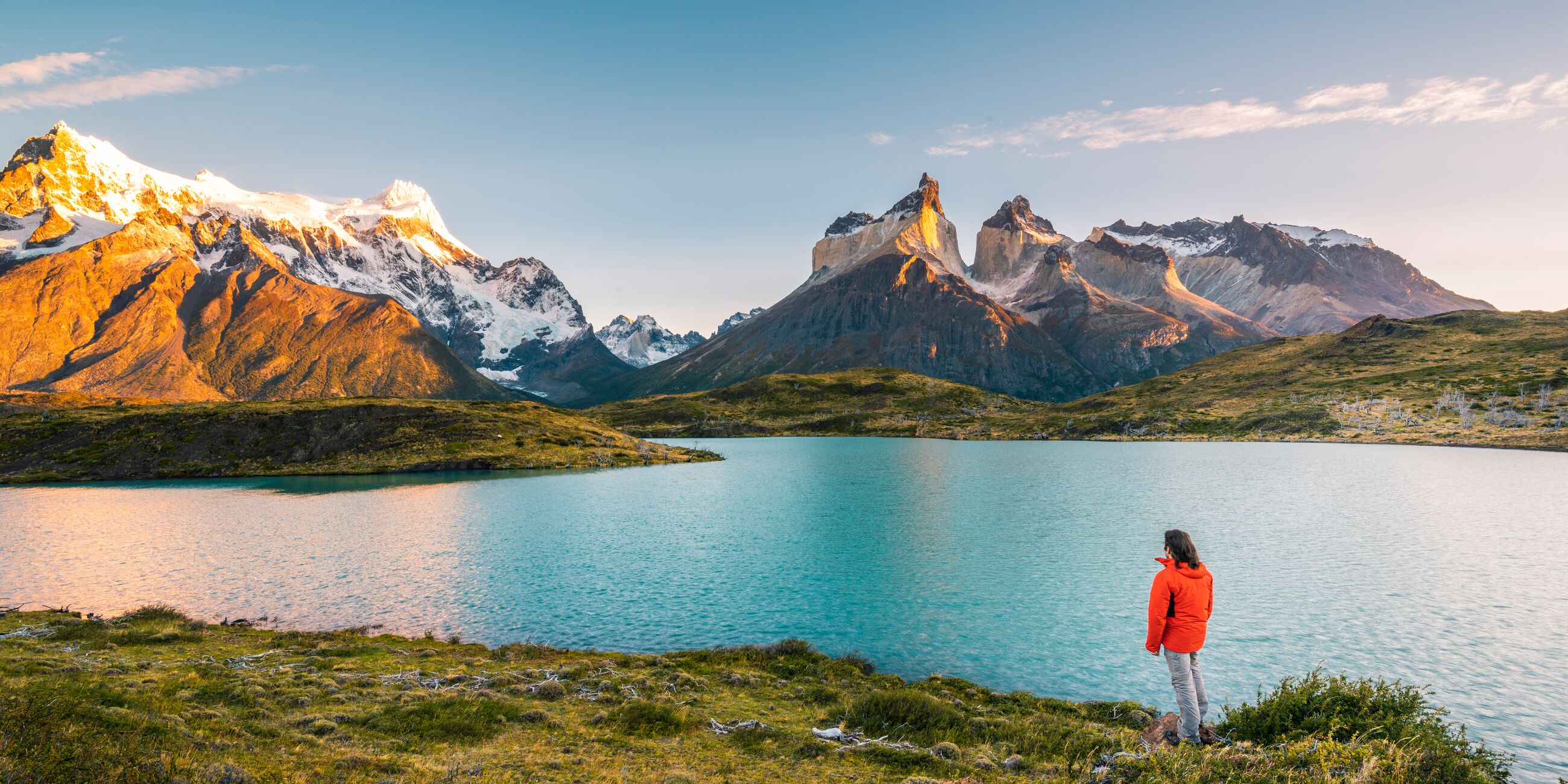 Tourist Admiring The Cordillera Paine In Torres Del Paine National Park Chile