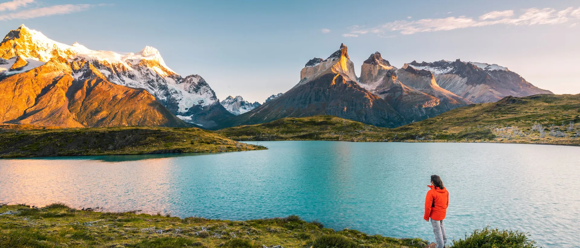 Tourist Admiring The Cordillera Paine In Torres Del Paine National Park Chile