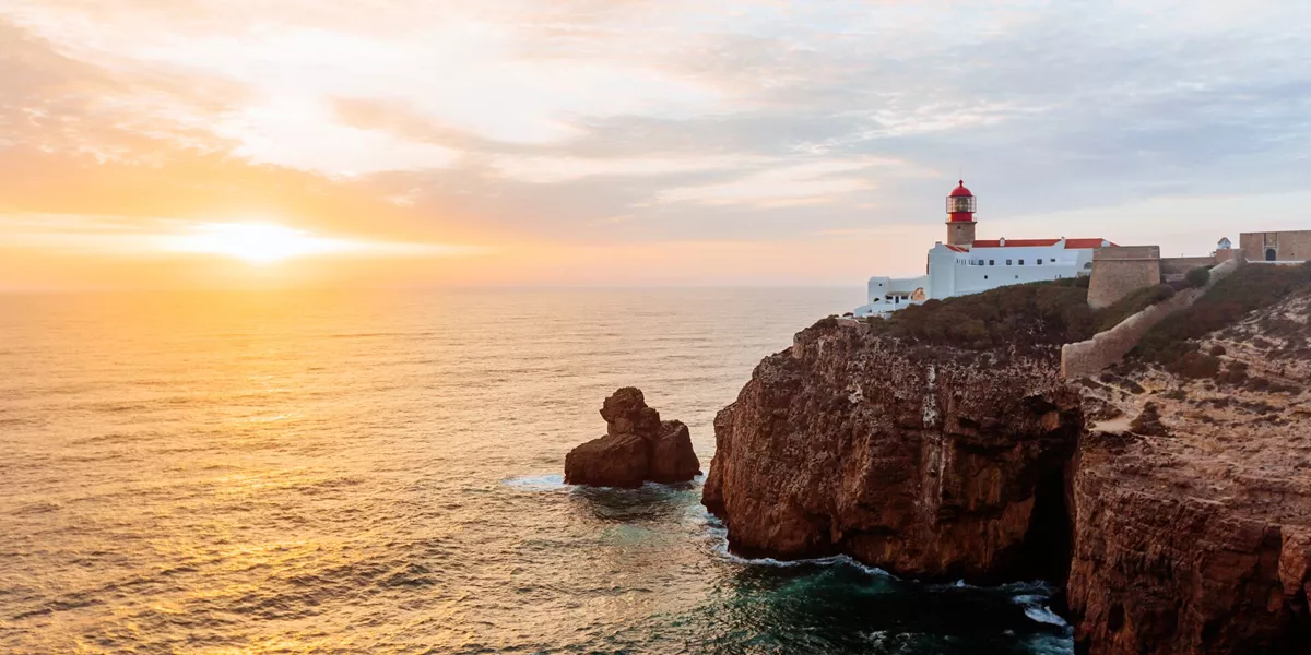 Lighthouse at Cabo De Sao Vincente at sunset in Algarve, Portugal