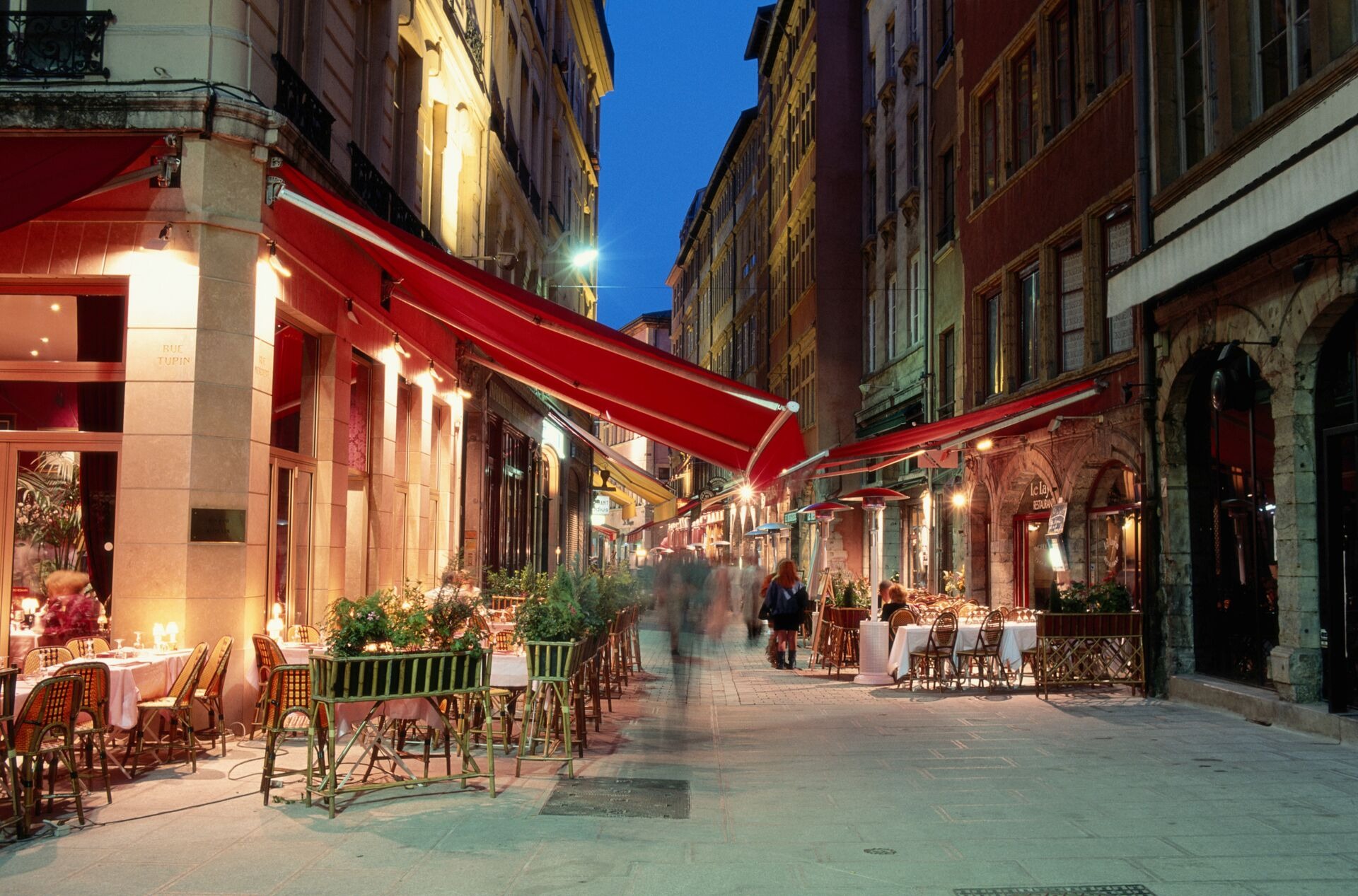 Outdoor Cafes At Night In Lyon France