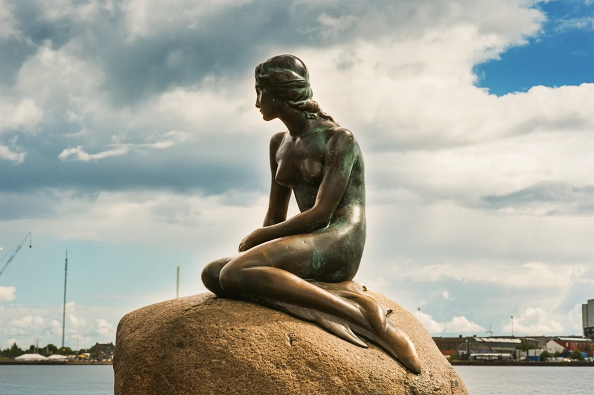 day-hero-statue-little-mermaid-copenhagen-denmark.webp