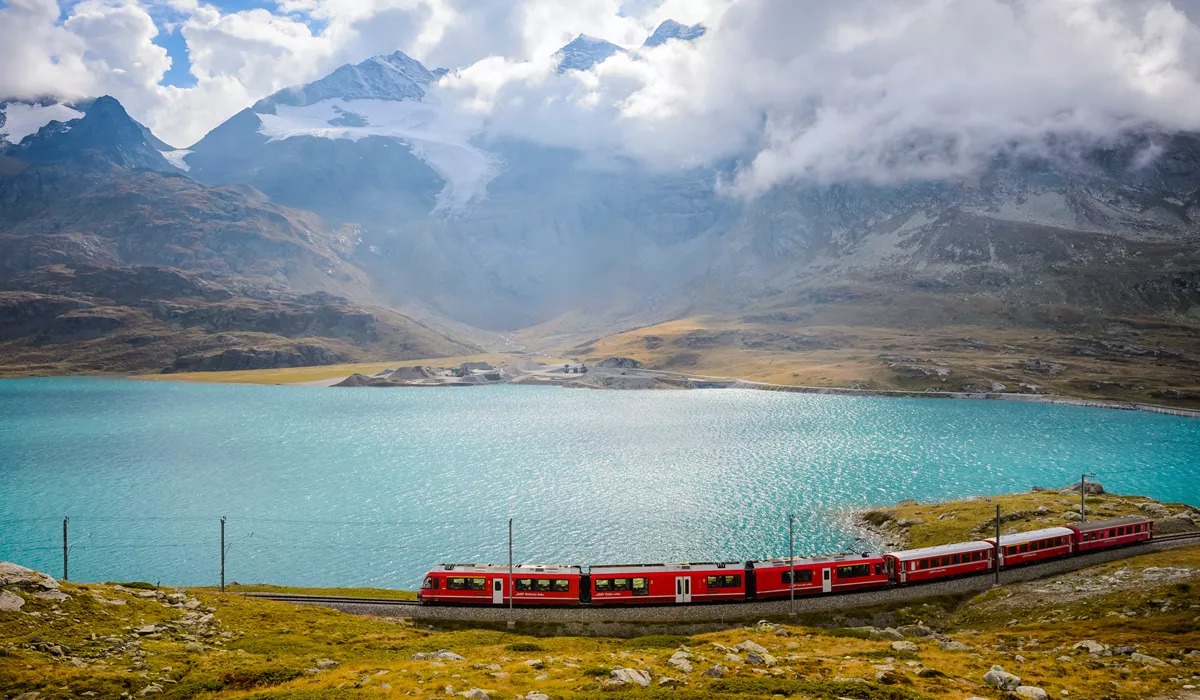 overlooking-view-of-train-running-on-the-bernina-railway-in-switzerland.jpg