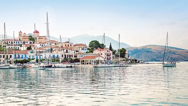 Boat anchored in the Mediterranean Sea, just off the harbour in Galaxidi, Greece
