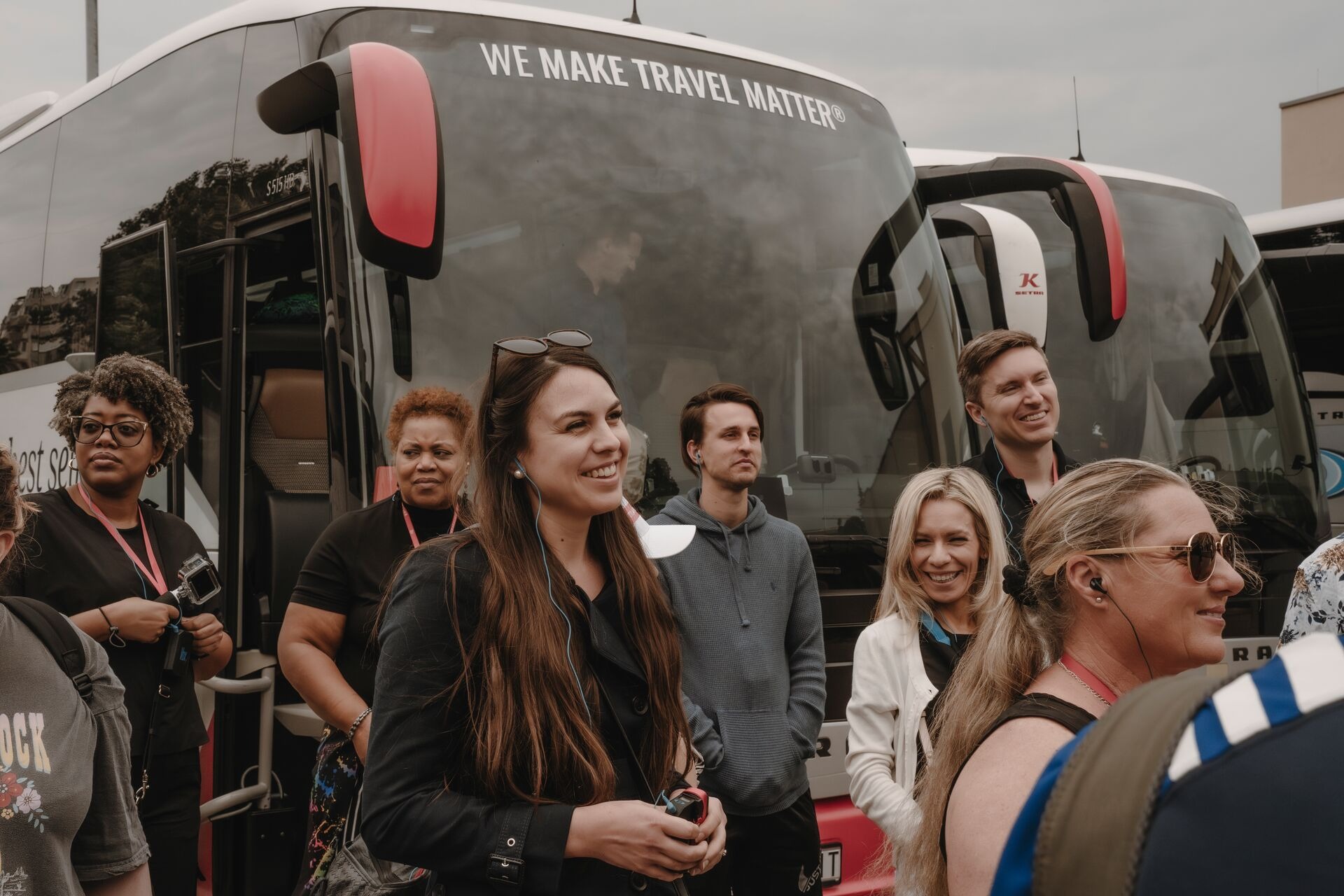 Group of tourists on the background of the coach