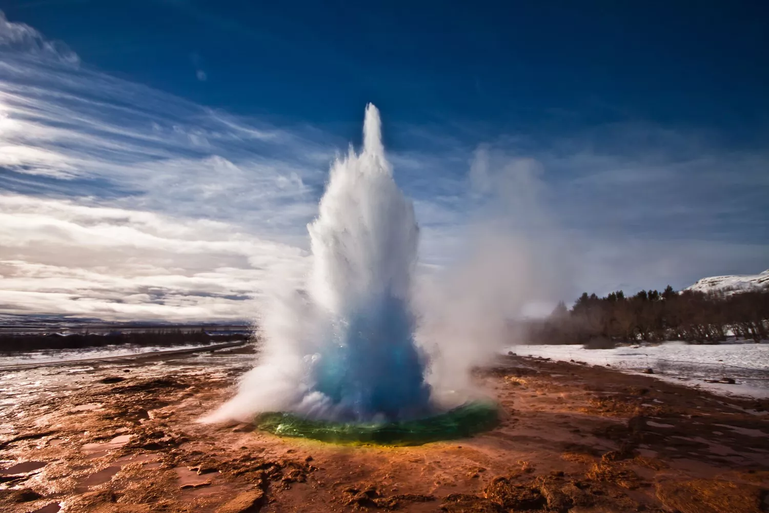 Strokkur Geyser erupting in Iceland