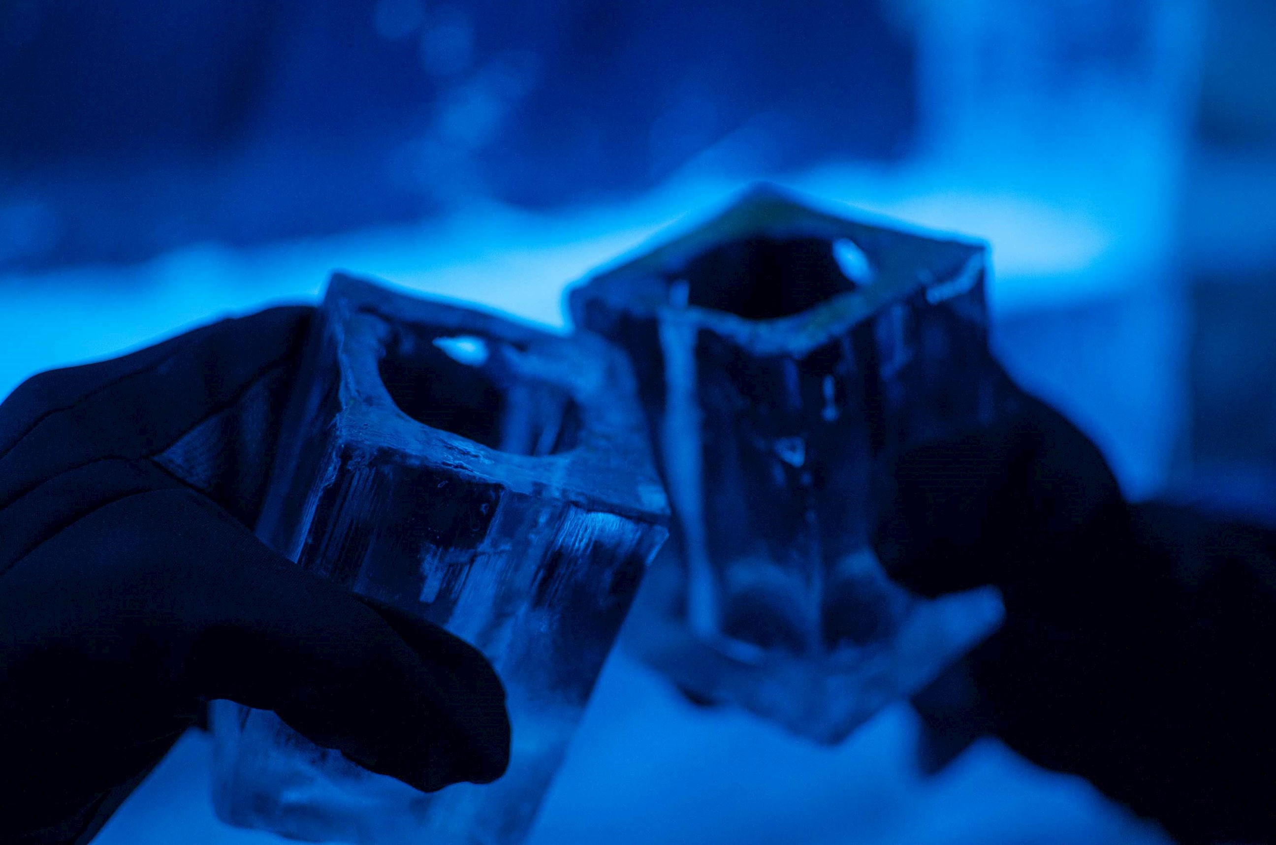 Two people toasting in an ice bar in Stockholm, Sweden