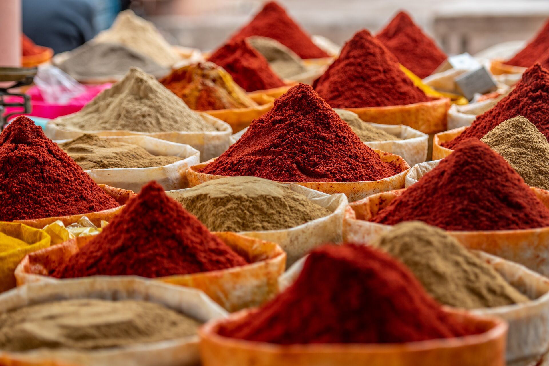 Piles of exotic spices on local street market in Morocco 