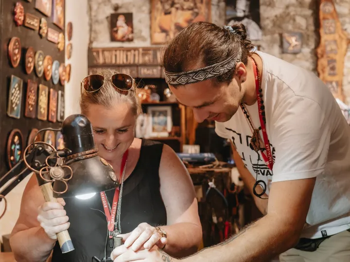 Woman Taking Crafting Lesson with Instructor