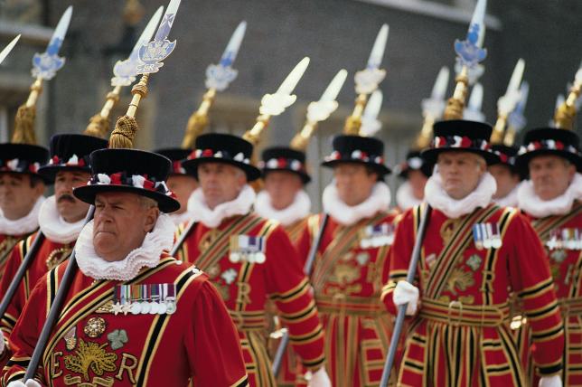 A group of men dressed in red and white uniforms.
