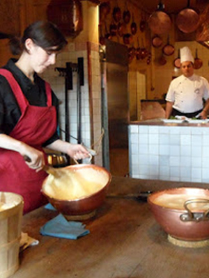 Coming right up! Chefs preparing omelettes – a local specialty in Mont St. Michel