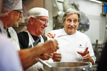 Florentine chef Libero teaching Trafalgar guests to make ravioli