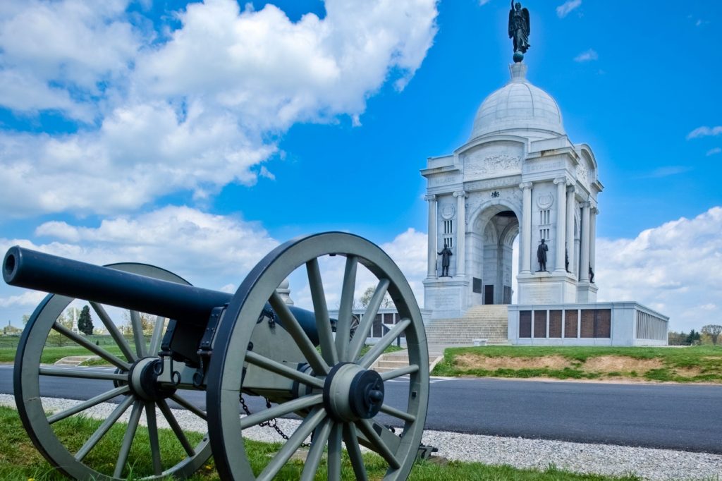 Cannon and monument in Gettysburg during Memorial Day in the US