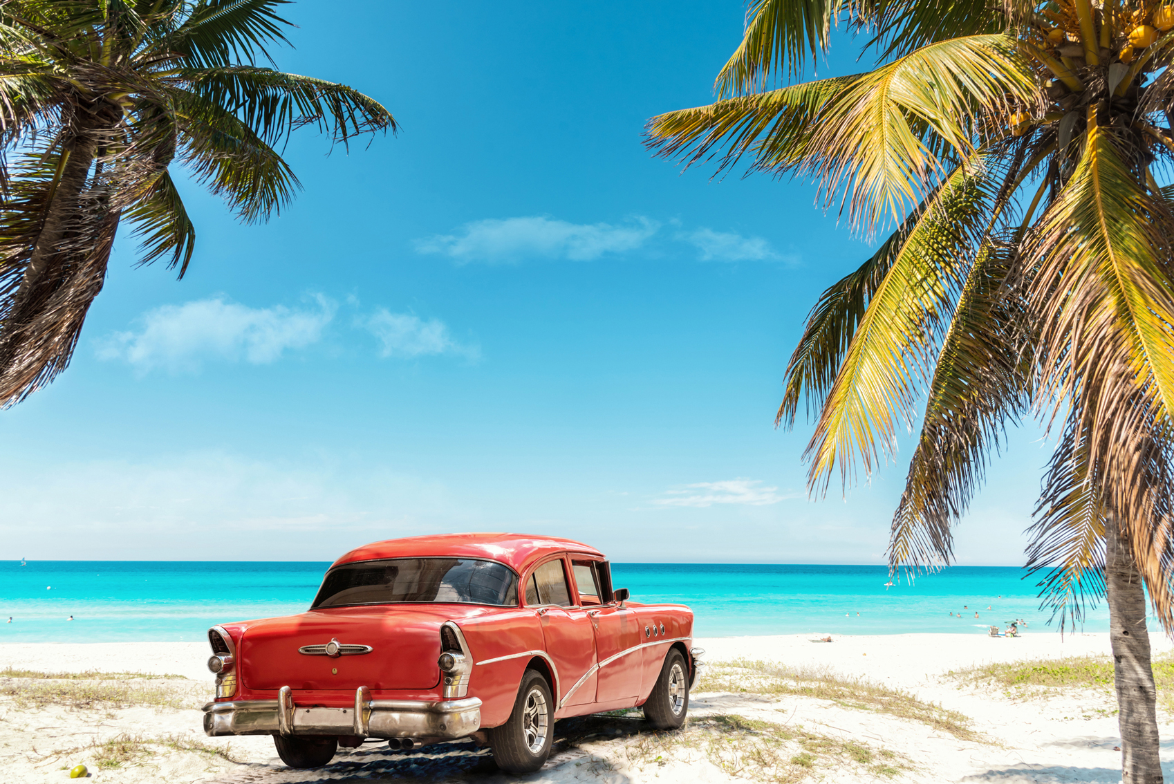 South American destinations Cuba-www.istockphoto.comgbphotoold-red-american-car-on-varadero-beach-in-cuba-gm647456074-117491345-golero