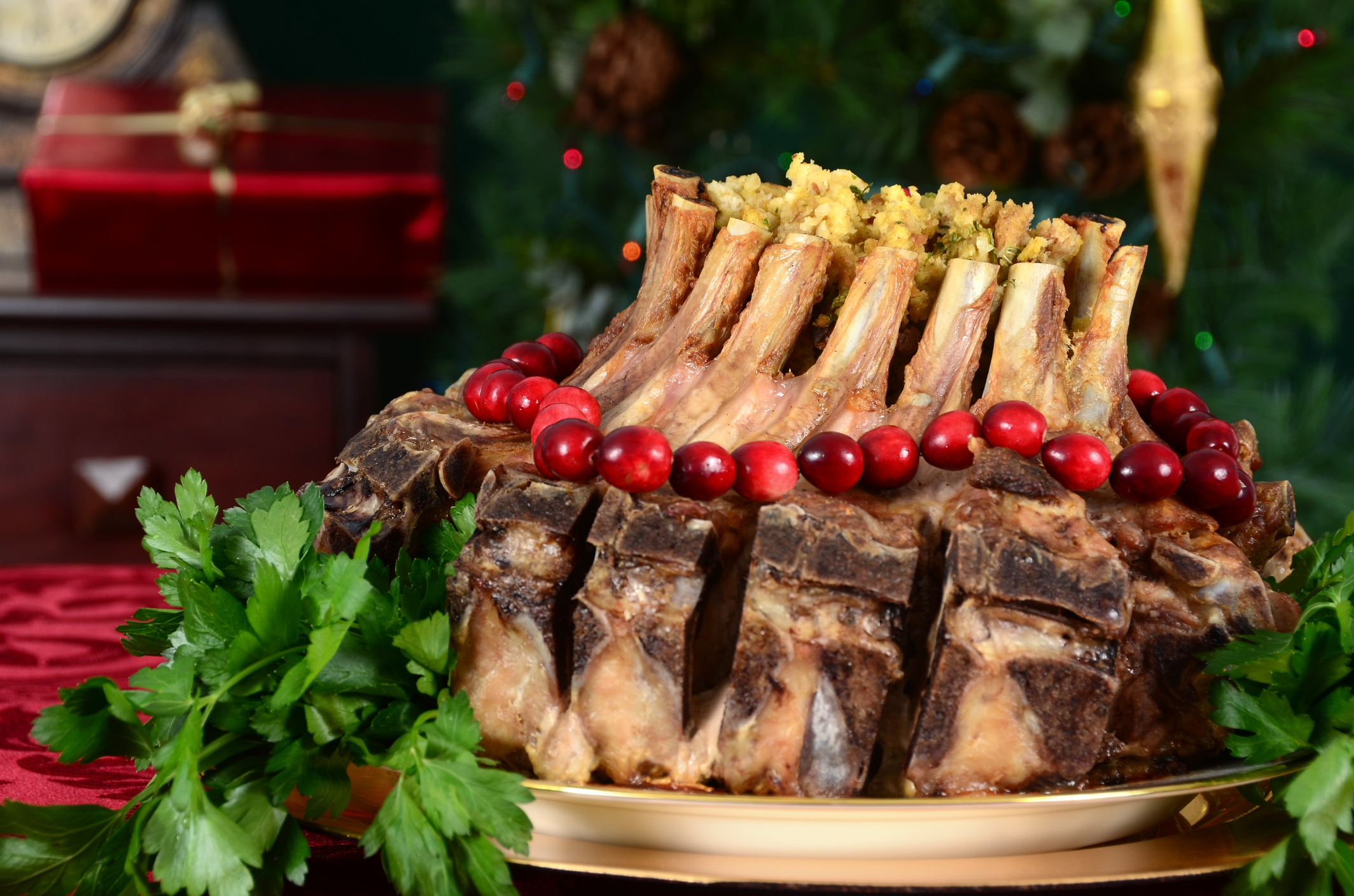 Scandinavian Christmas dishes A Christmas crown roast of pork meal in festive background