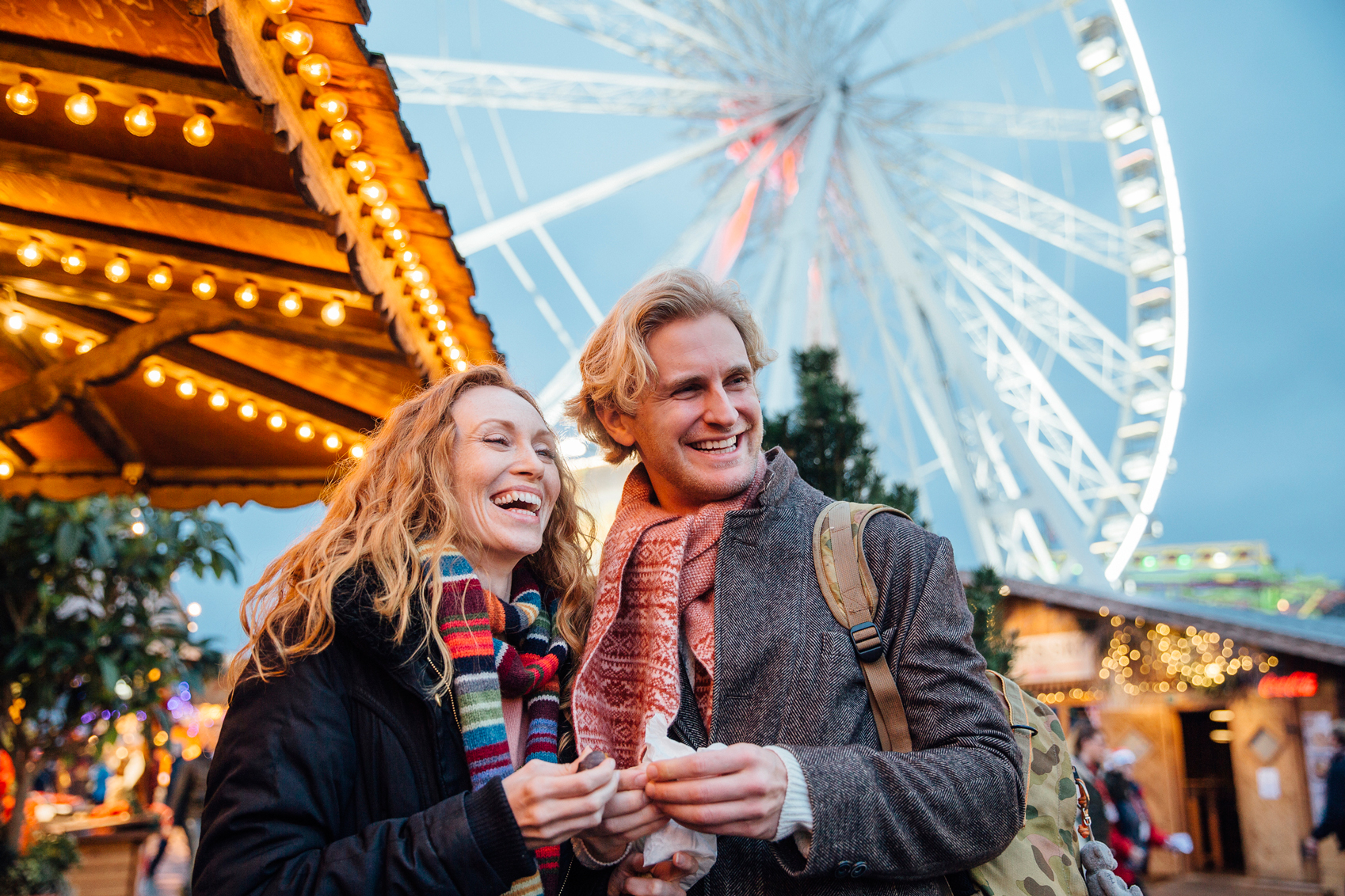 24 hours in London Winter-Wonderlandwww.istockphoto.comgbphotocouple-enjoying-christmas-fair-gm826668564-134351399-SolStock