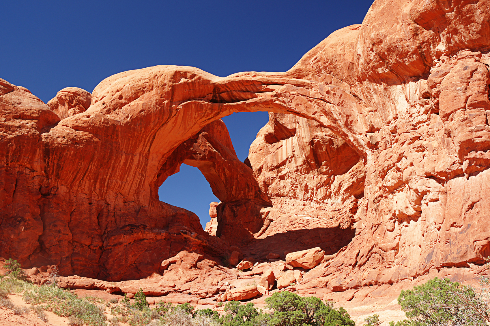 America's National Parks arches-National-park-www.istockphoto.comgbphotodouble-arch-arches-national-park-moab-utah-gm183359414-15105975-TheCrimsonMonkey