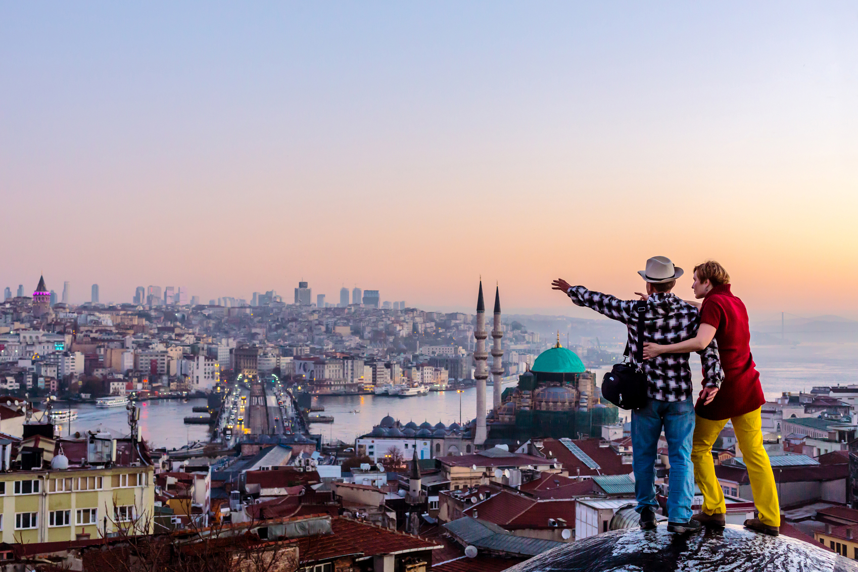 Best Value European Cities couple-over-cityscape-www.istockphoto.com_gb_photo_couple-travelling-together-staying-on-roof-and-overlooking-cityscape-gm637311894-113626071-AlexBrylov