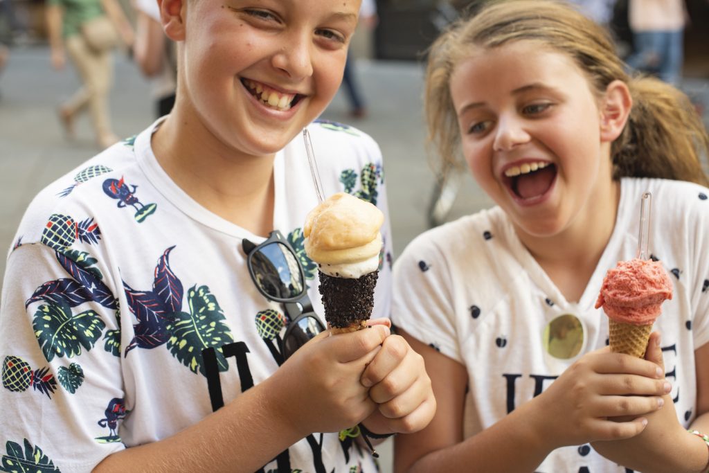 two children holding ice creams