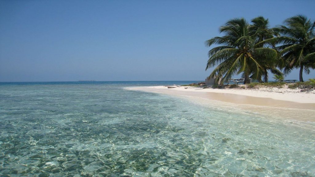 Crystal water white beach Placencia Belize