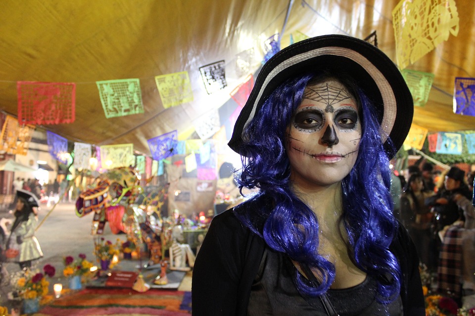 lady at day of the dead celebration in mexico