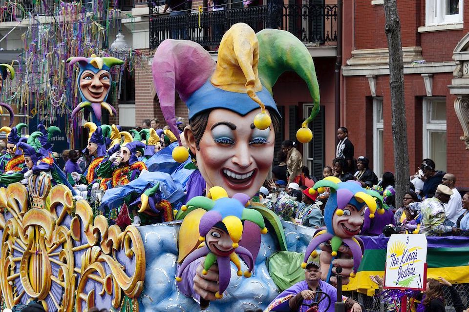 Experience the vibrant Mardi Gras parade in New Orleans, one of the hottest holiday destinations.