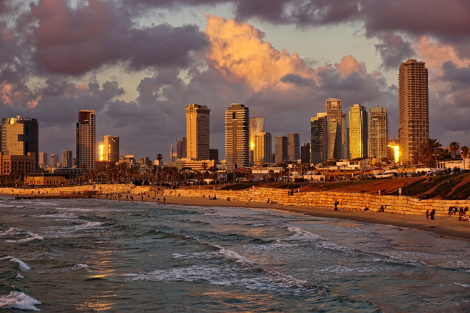 Tel Aviv beach with city skyline behind