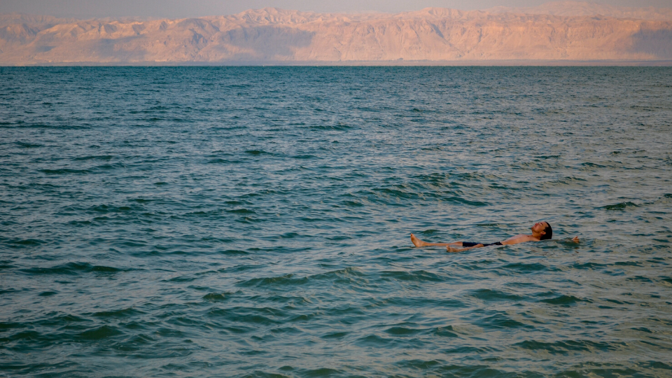 Man floating on Dead Sea in Israel